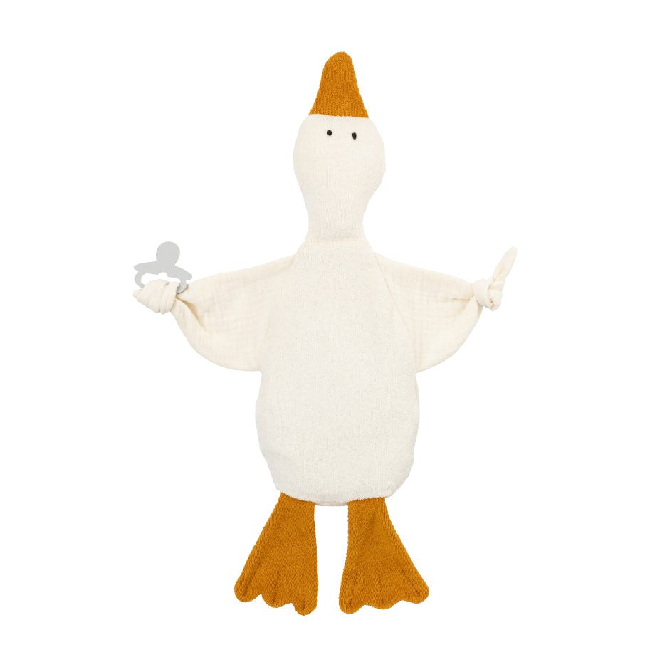Weiches Wärmekissen mit Kirschkernfüllung in Form einer Gans aus Bio-Baumwolle mit senfgelben Füßen und Schnabel sowie integriertem Beißring für Babys.